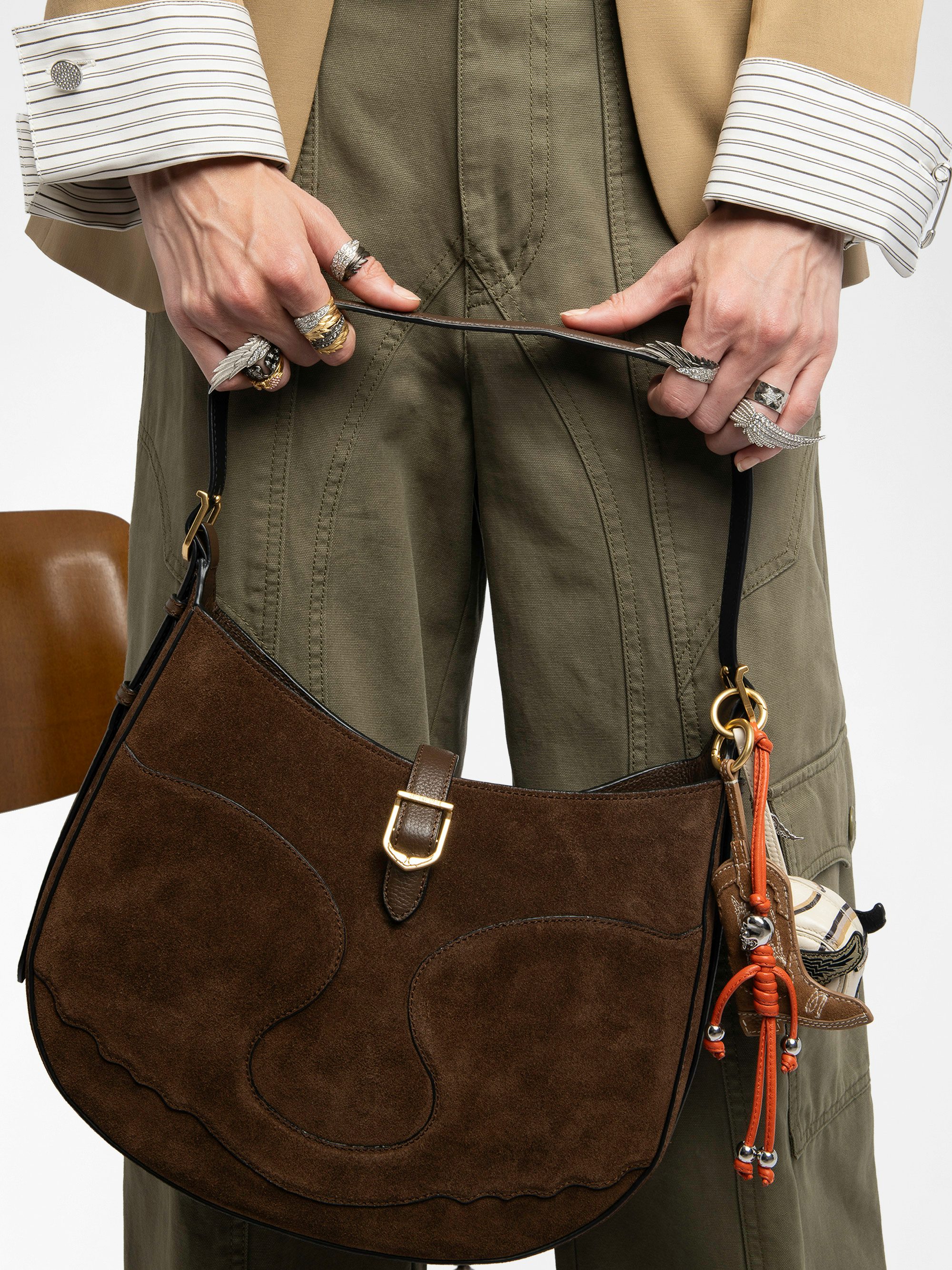 Moonrise Hobo Bag - Hobo bag in suede with leather handle and signature wings.